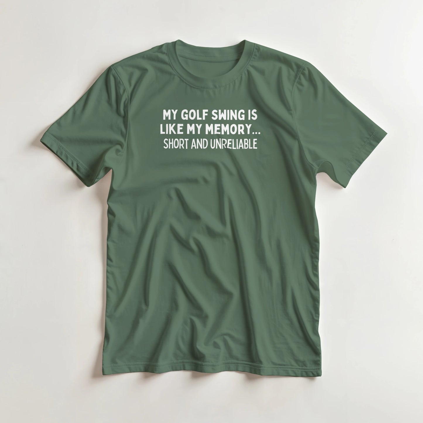 Memory T-Shirt in Military Green 2XL lying on a plain floor. T-shirt is a unisex cut and 100 per cent cotton.