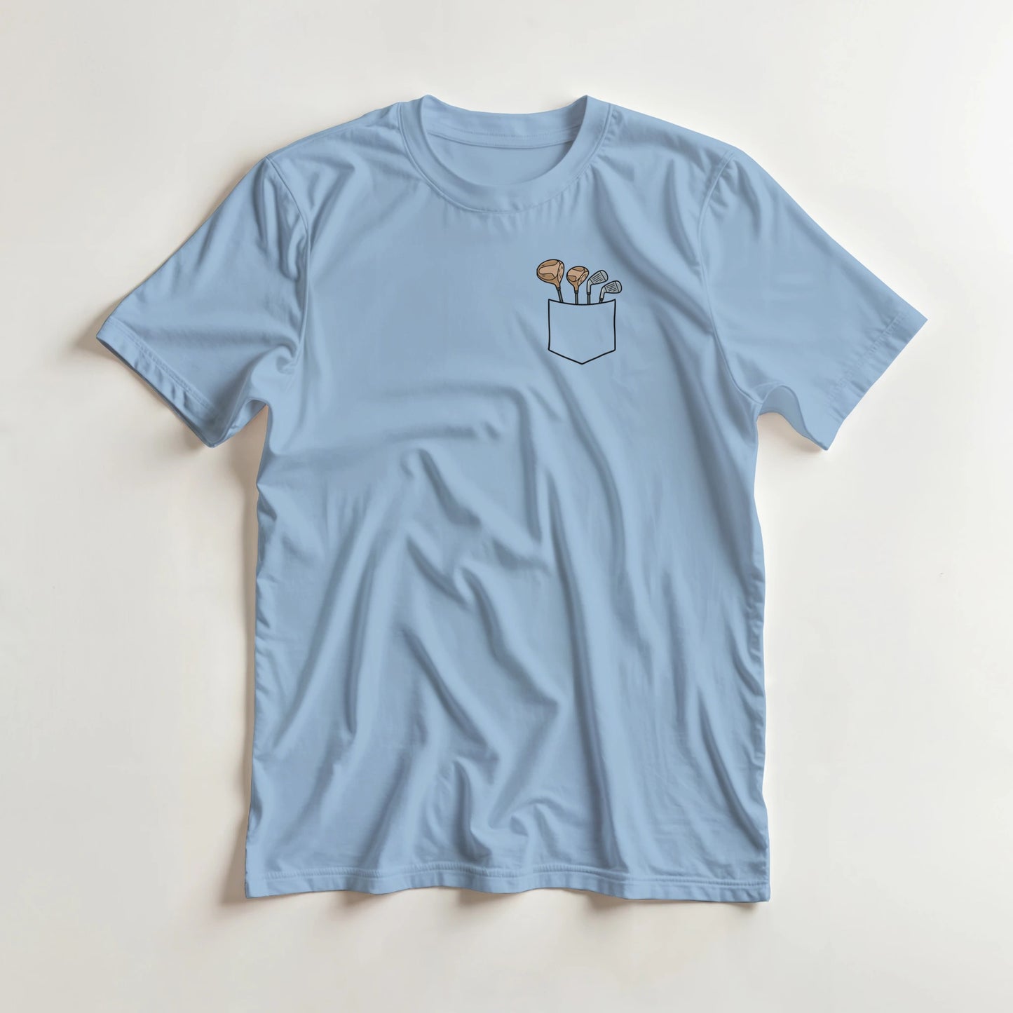 Club Pocket T-Shirt in Light Blue lying on a plain floor. T-shirt is a unisex cut and 100 per cent cotton.