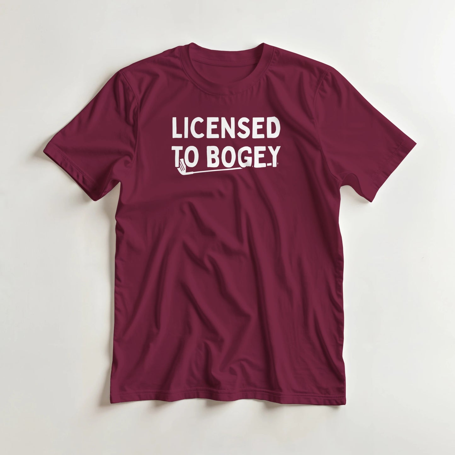 Licensed T-Shirt in Maroon S lying on a plain floor. T-shirt is a unisex cut and 100 per cent cotton.