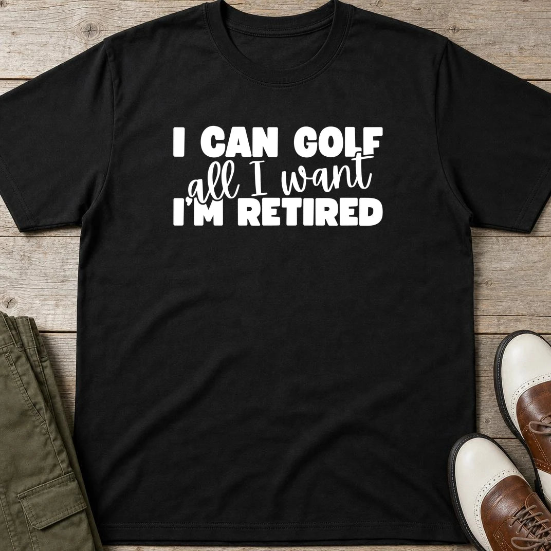Golf All I Want T-Shirt in Black lying on a plain floor. T-shirt is a unisex cut and 100 per cent cotton.