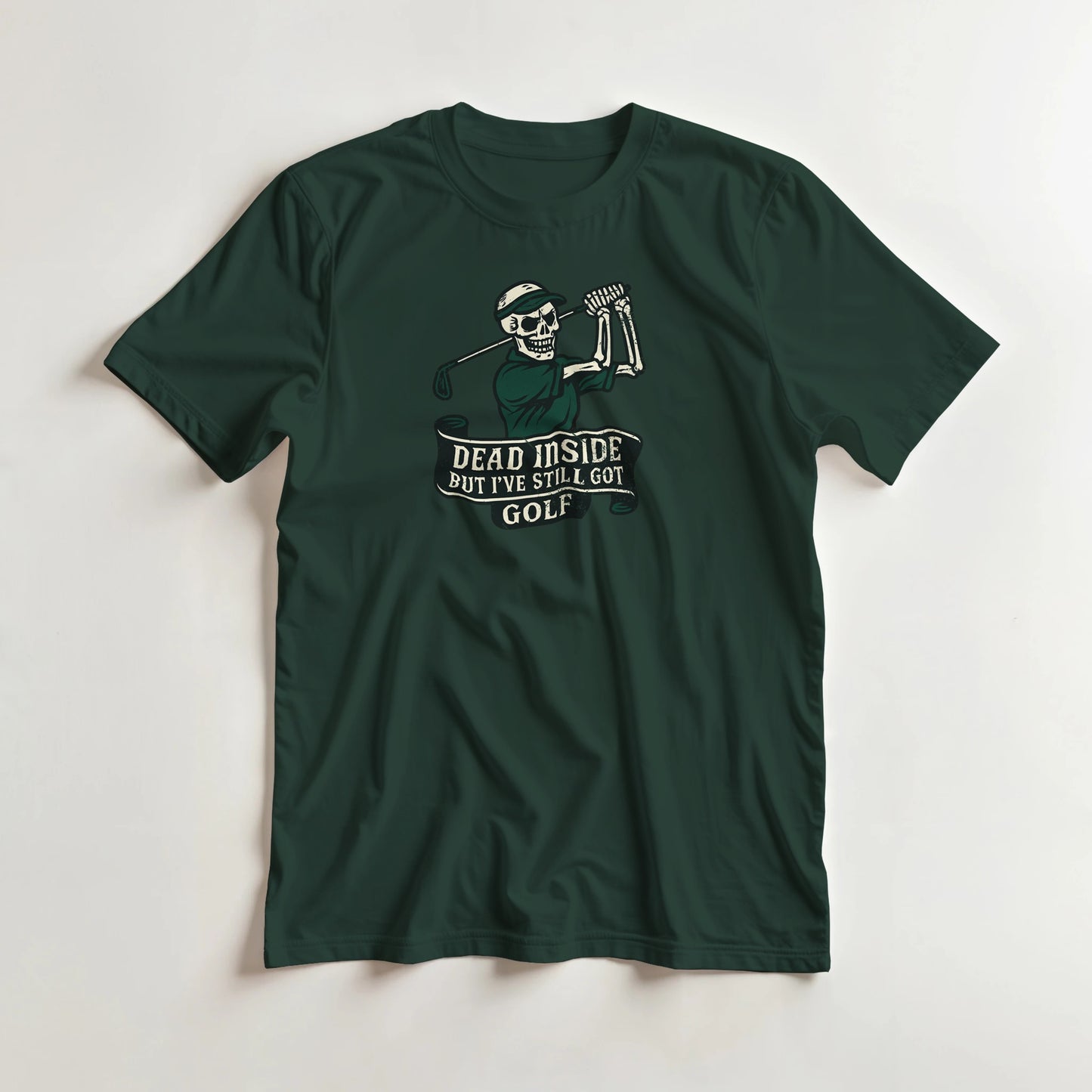 Dead Inside T-Shirt in Forest Green lying on a plain floor. T-shirt is a unisex cut and 100 per cent cotton.