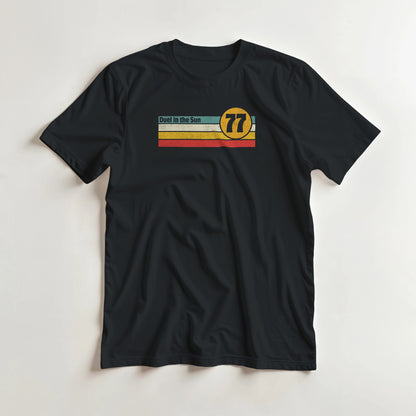 Duel Sun T-Shirt in Black XL lying on a plain floor. T-shirt is a unisex cut and 100 per cent cotton.