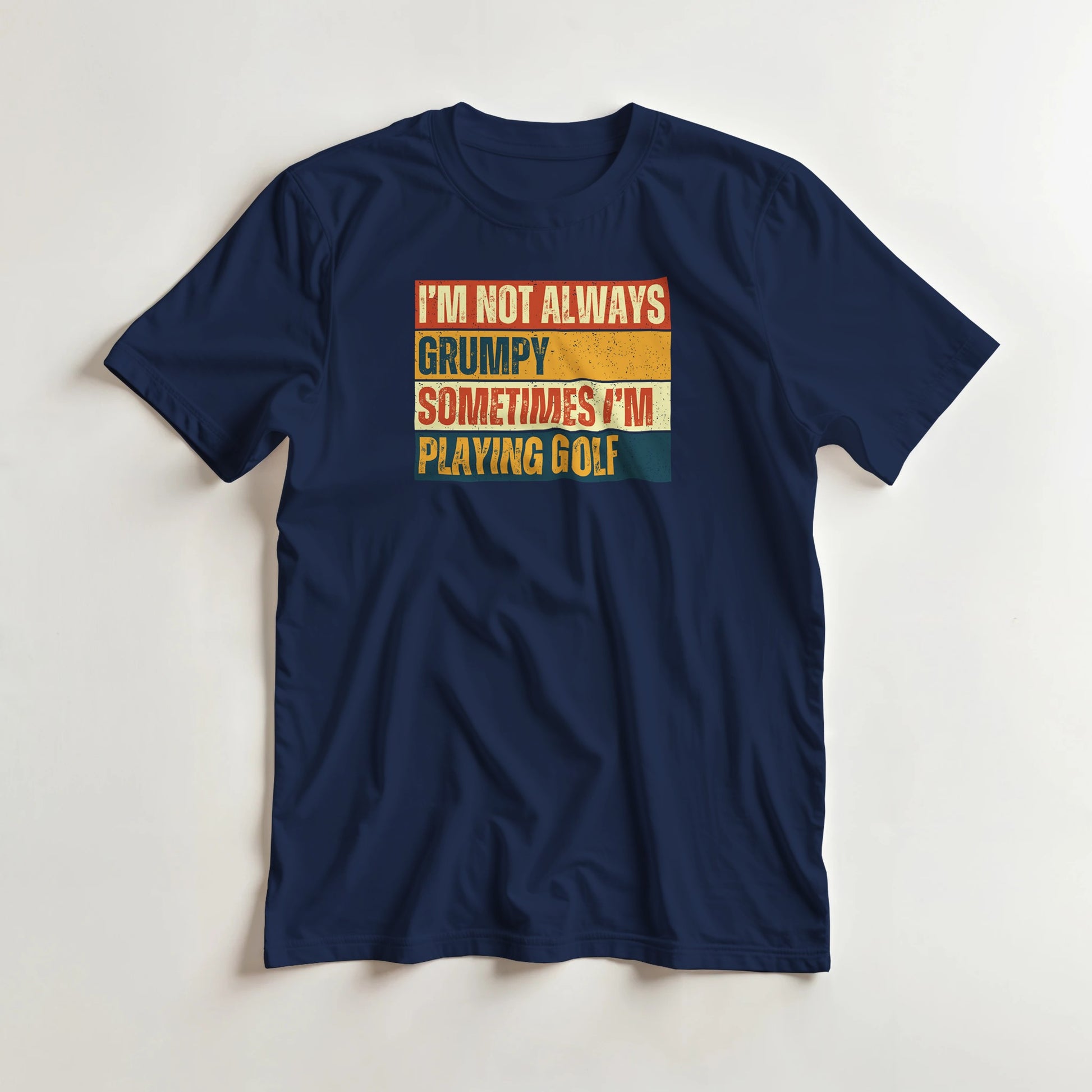 Grumpy Vintage T-Shirt in Navy lying on a plain floor. T-shirt is a unisex cut and 100 per cent cotton.