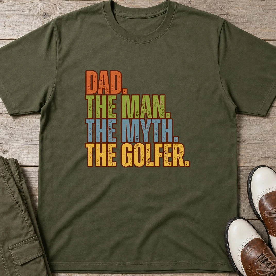Dad The Legend Golfer T-Shirt in Military Green lying on a plain floor. T-shirt is a unisex cut and 100 per cent cotton.