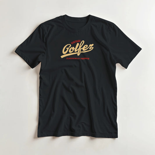 Vintage Golfer II T-Shirt in S lying on a plain floor. T-shirt is a unisex cut and 100 per cent cotton.