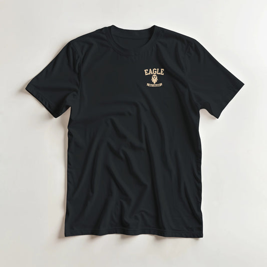Eagle College (Pocket) T-Shirt in Black lying on a plain floor. T-shirt is a unisex cut and 100 per cent cotton.