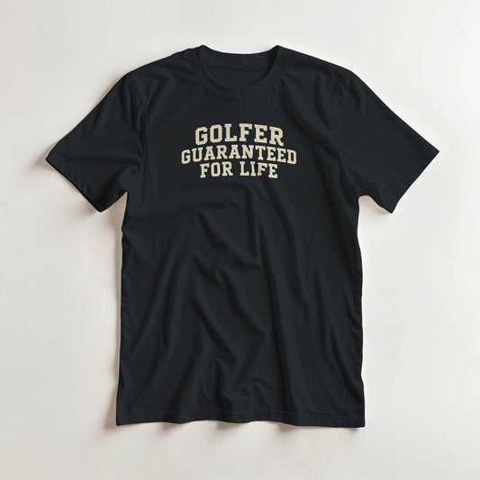 Golfer Guaranteed T-Shirt in Black S lying on a plain floor. T-shirt is a unisex cut and 100 per cent cotton.