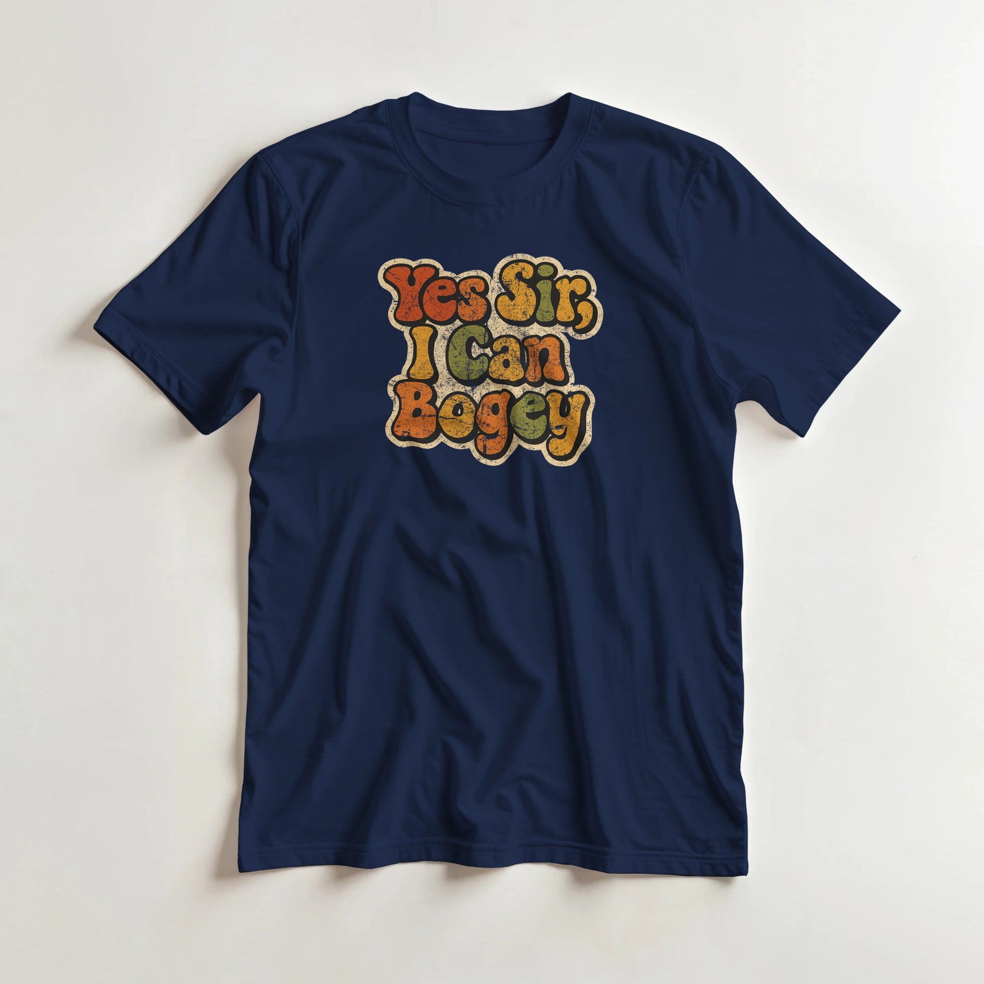 I Can Bogey T-Shirt in Navy S lying on a plain floor. T-shirt is a unisex cut and 100 per cent cotton.