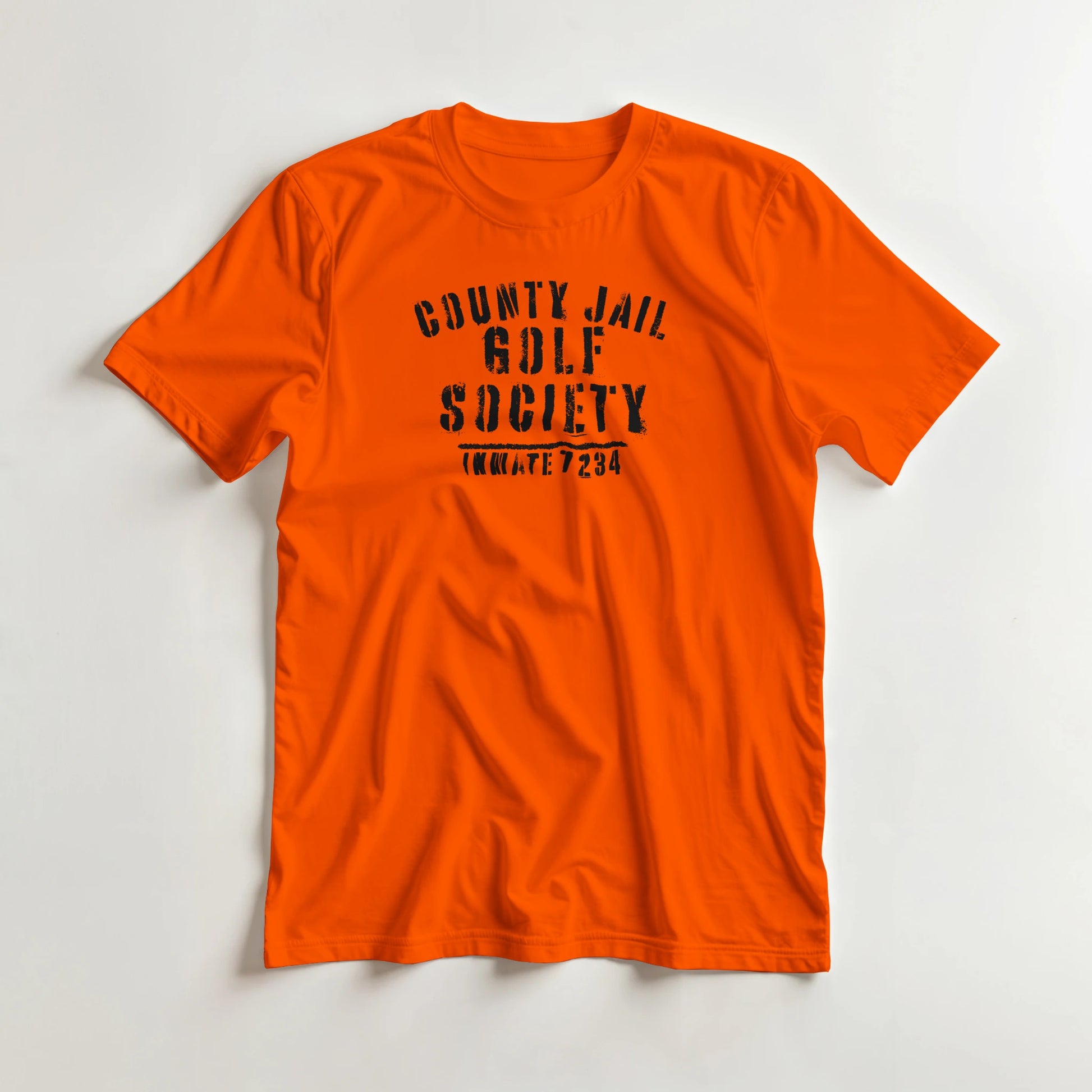 County Jail T-Shirt in S lying on a plain floor. T-shirt is a unisex cut and 100 per cent cotton.