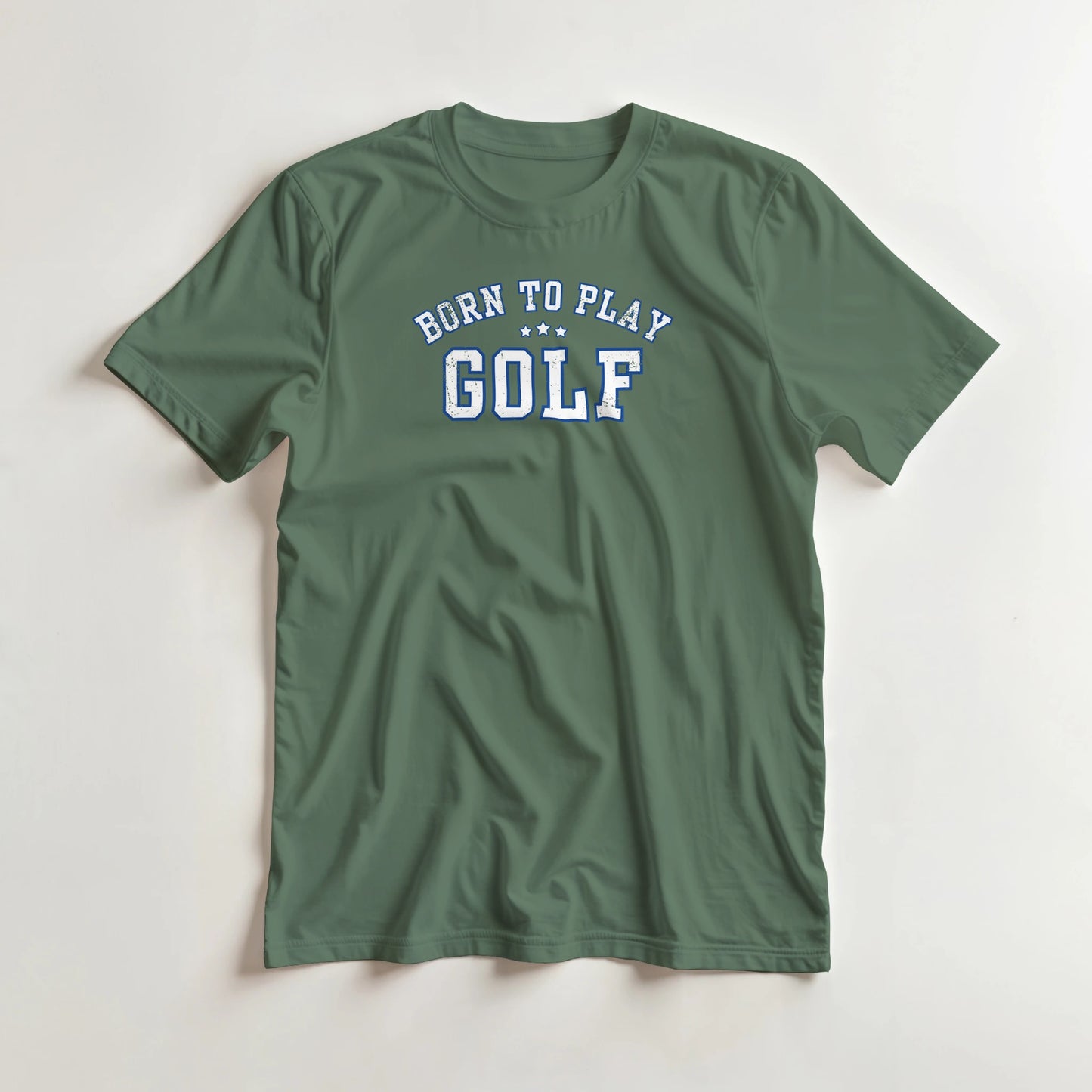 Born To Play Golf T-Shirt in Military Green lying on a plain floor. T-shirt is a unisex cut and 100 per cent cotton.