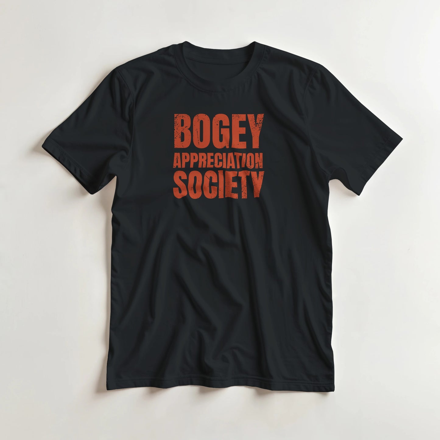 Bogey Appreciation T-Shirt in Black 3XL lying on a plain floor. T-shirt is a unisex cut and 100 per cent cotton.
