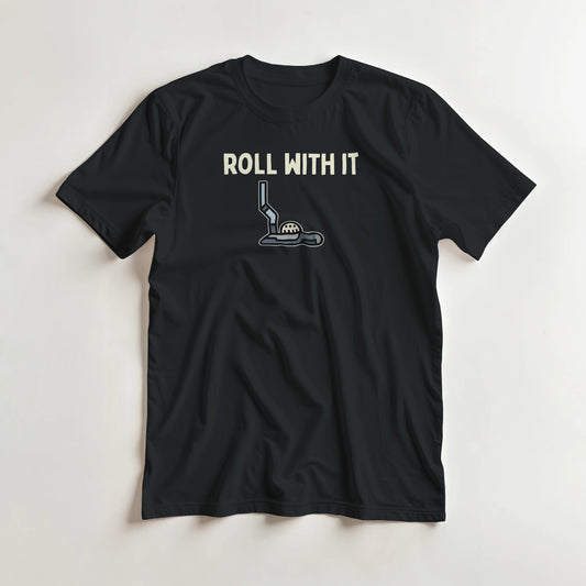 Roll With It T-Shirt in Black lying on a plain floor. T-shirt is a unisex cut and 100 per cent cotton.