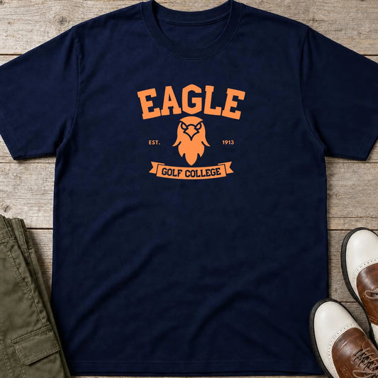 Eagle College T-Shirt in Navy lying on a plain floor. T-shirt is a unisex cut and 100 per cent cotton.