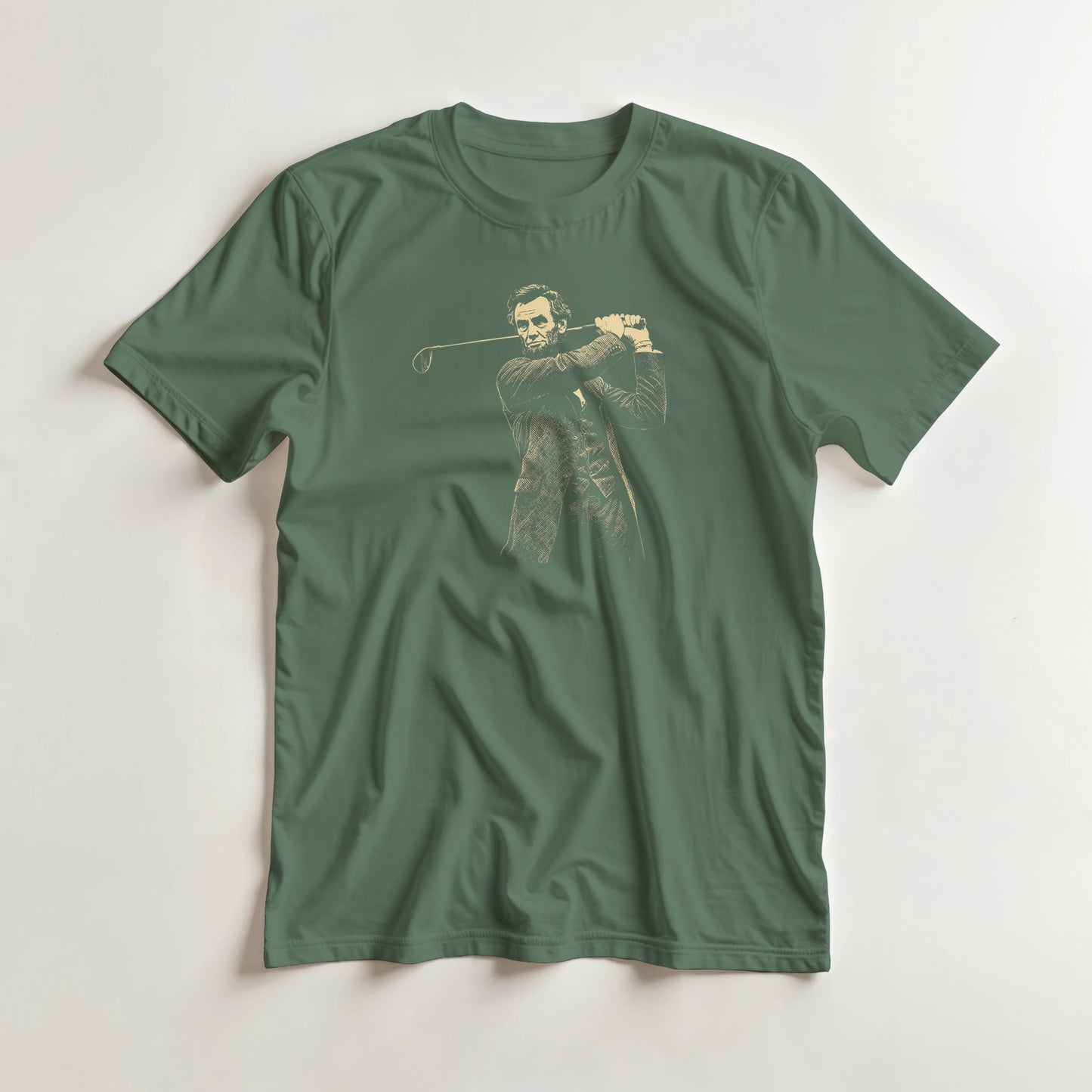 Lincoln On Course T-Shirt in Military Green lying on a plain floor. T-shirt is a unisex cut and 100 per cent cotton.