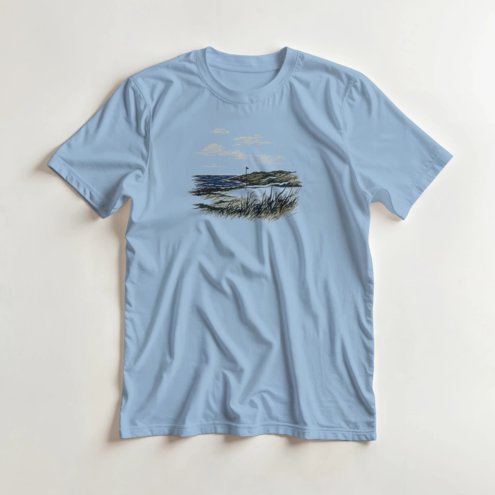 Tranquillity T-Shirt in lying on a plain floor. T-shirt is a unisex cut and 100 per cent cotton.