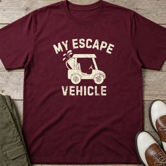 Escape Vehicle T-Shirt in Maroon lying on a plain floor. T-shirt is a unisex cut and 100 per cent cotton.