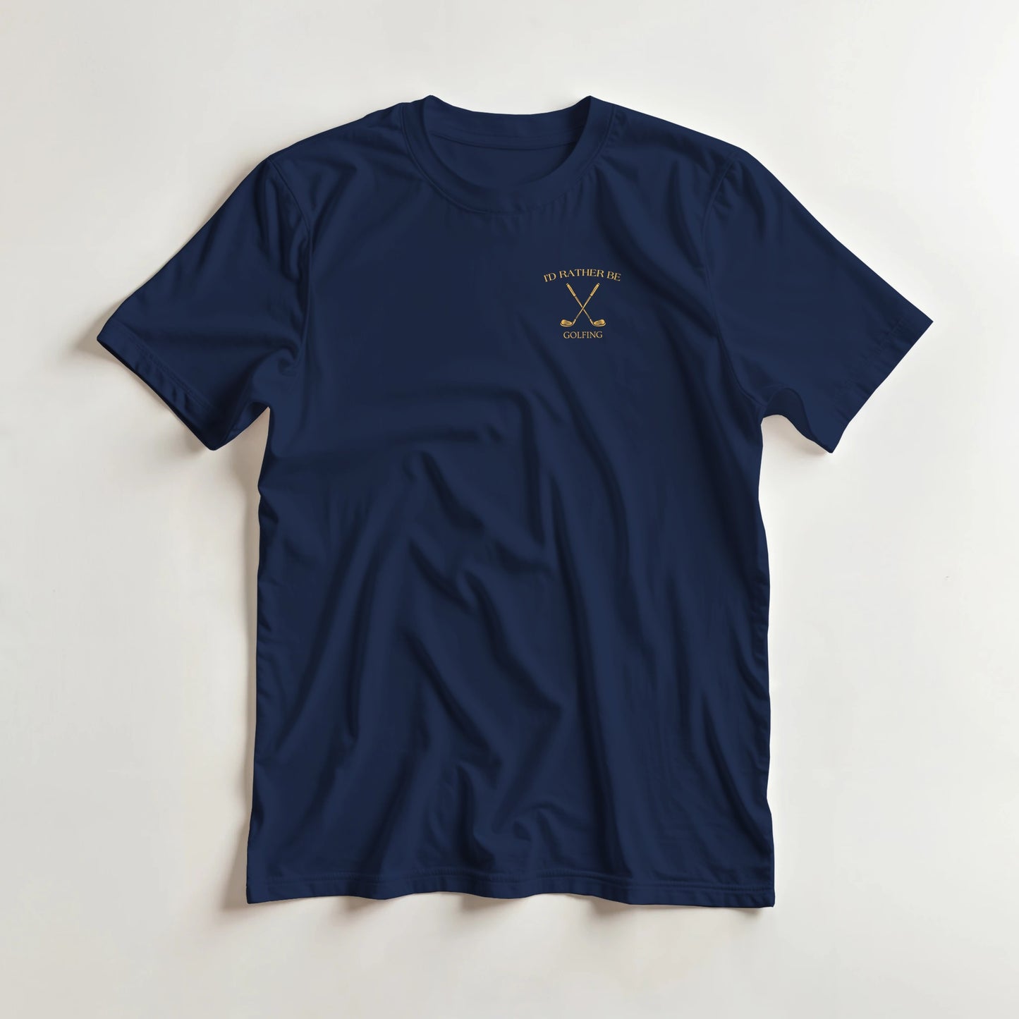 Rather Be Golfing T-Shirt in Navy lying on a plain floor. T-shirt is a unisex cut and 100 per cent cotton.