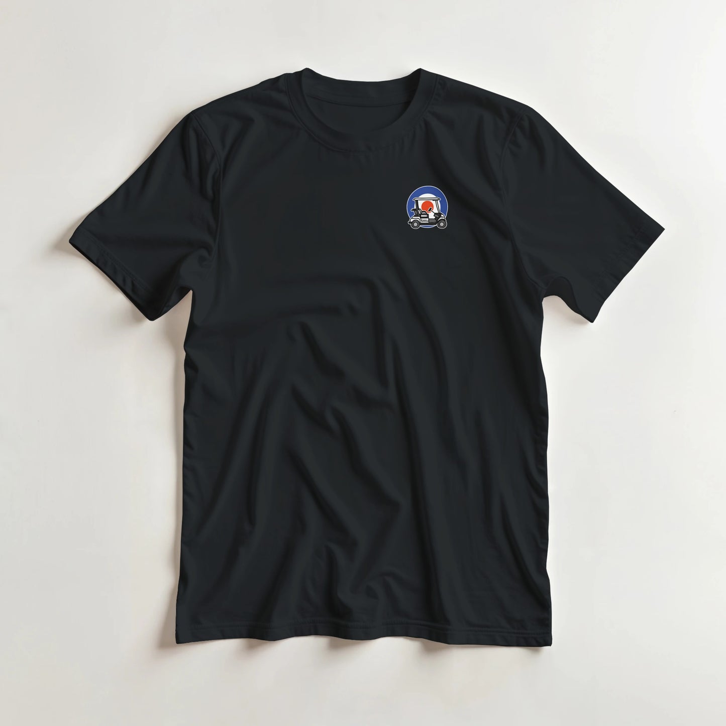 Mod Cart Pocket T-Shirt in Black S lying on a plain floor. T-shirt is a unisex cut and 100 per cent cotton.