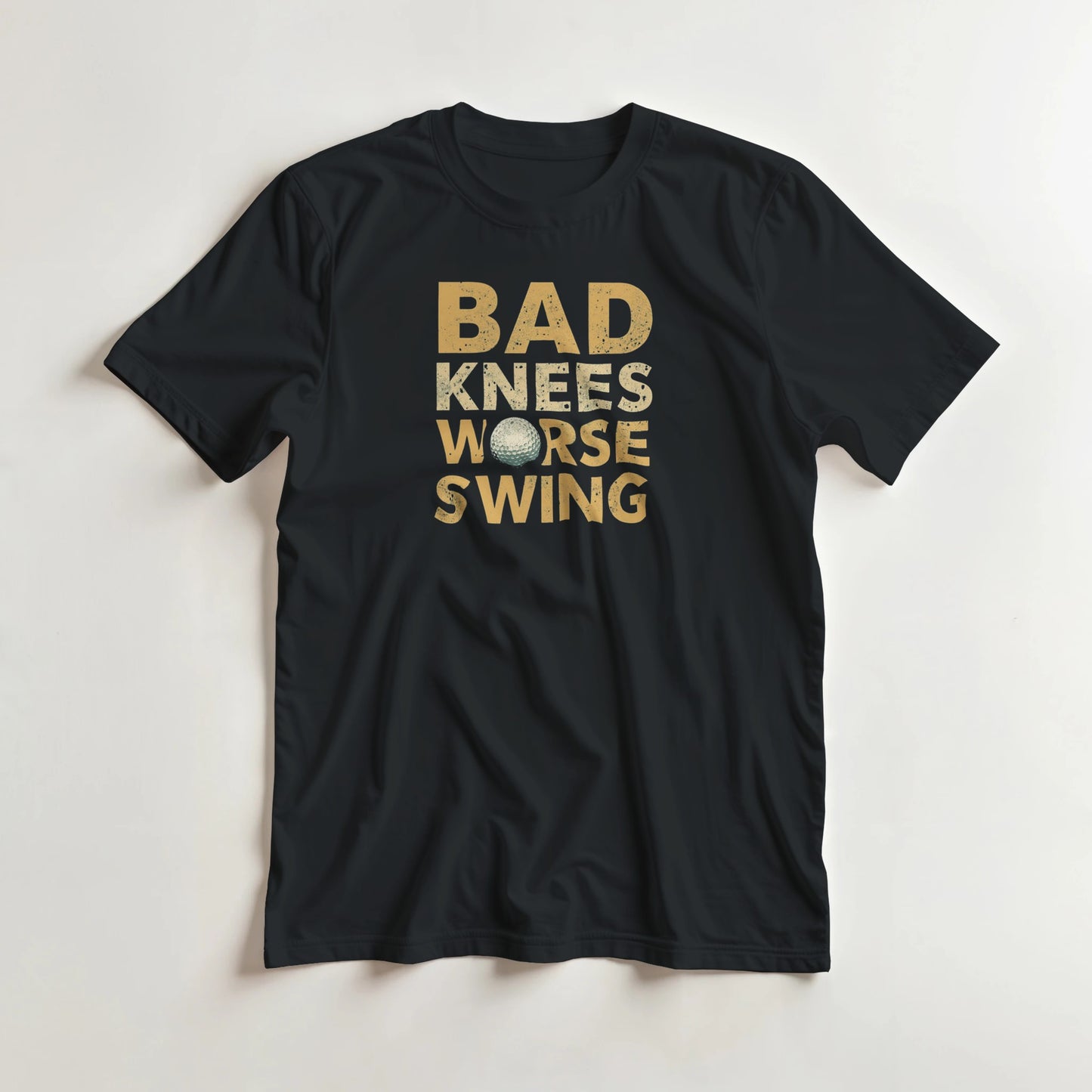 Bad Knees II T-Shirt in Black M lying on a plain floor. T-shirt is a unisex cut and 100 per cent cotton.