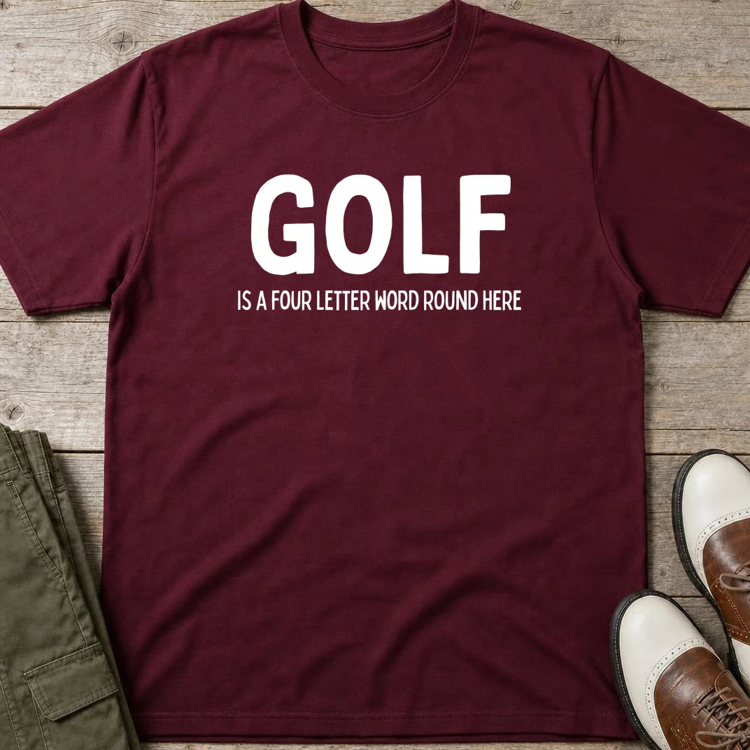 Four Letter Word T-Shirt in Maroon lying on a plain floor. T-shirt is a unisex cut and 100 per cent cotton.