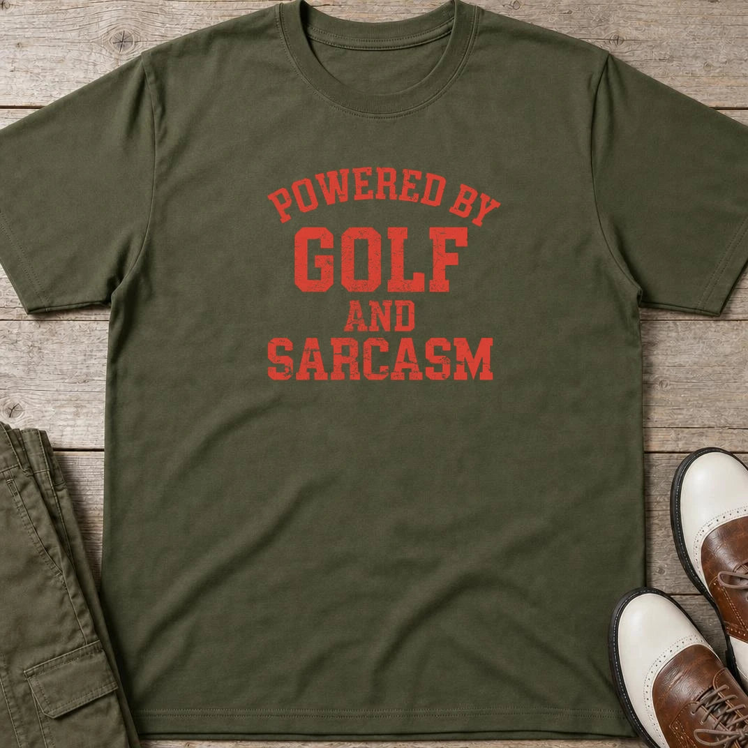 Powered By T-Shirt in Military Green lying on a plain floor. T-shirt is a unisex cut and 100 per cent cotton.