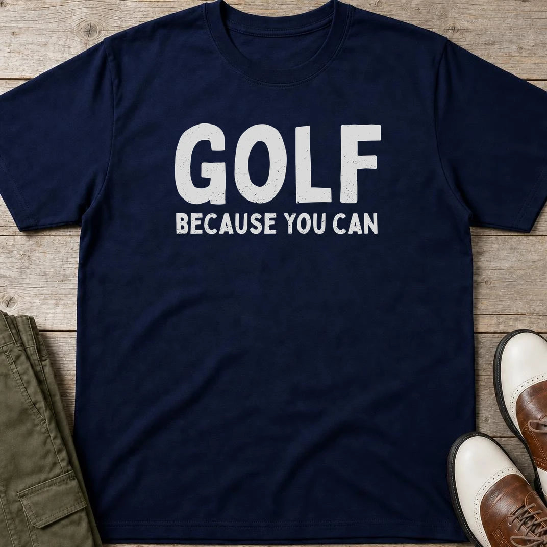 Because You Can T-Shirt in Navy lying on a plain floor. T-shirt is a unisex cut and 100 per cent cotton.