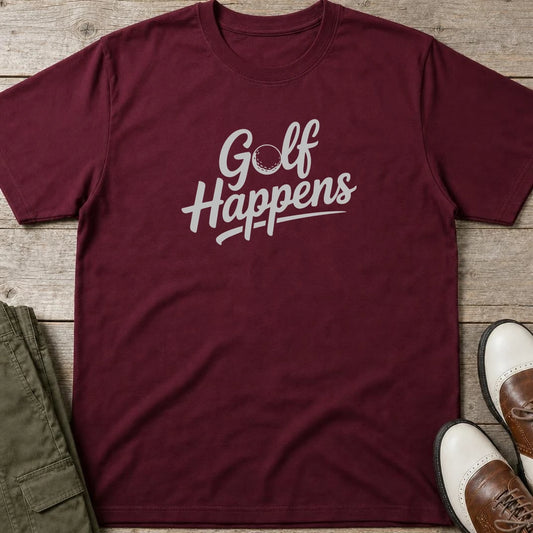 Golf Happens T-Shirt in Maroon lying on a plain floor. T-shirt is a unisex cut and 100 per cent cotton.