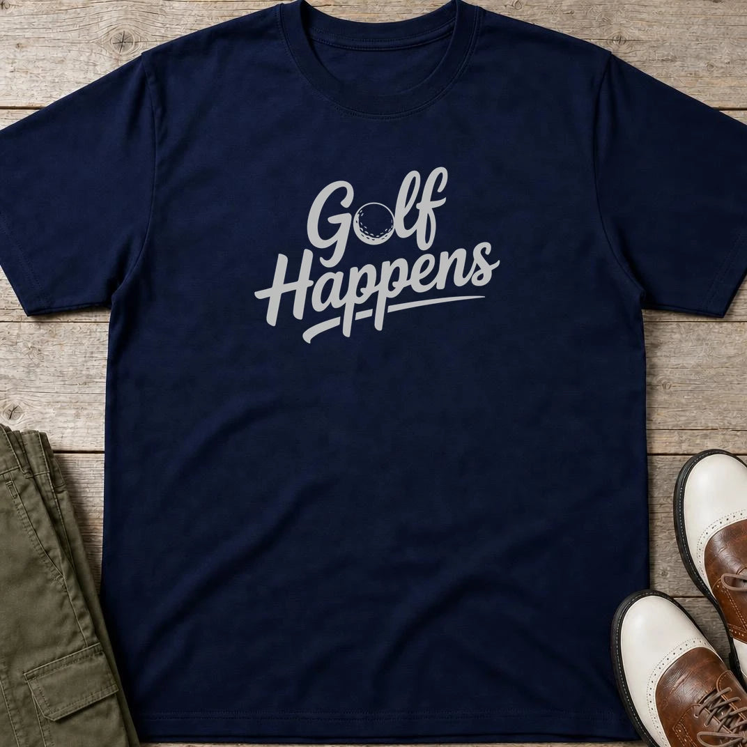 Golf Happens T-Shirt in Navy lying on a plain floor. T-shirt is a unisex cut and 100 per cent cotton.