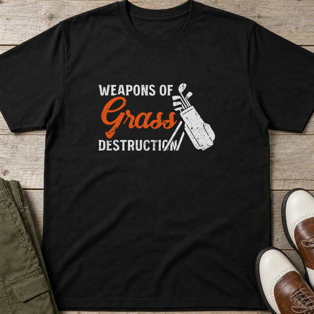 Weapons T-Shirt in Black lying on a plain floor. T-shirt is a unisex cut and 100 per cent cotton.