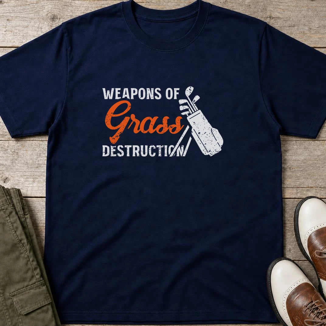 Weapons T-Shirt in Navy lying on a plain floor. T-shirt is a unisex cut and 100 per cent cotton.