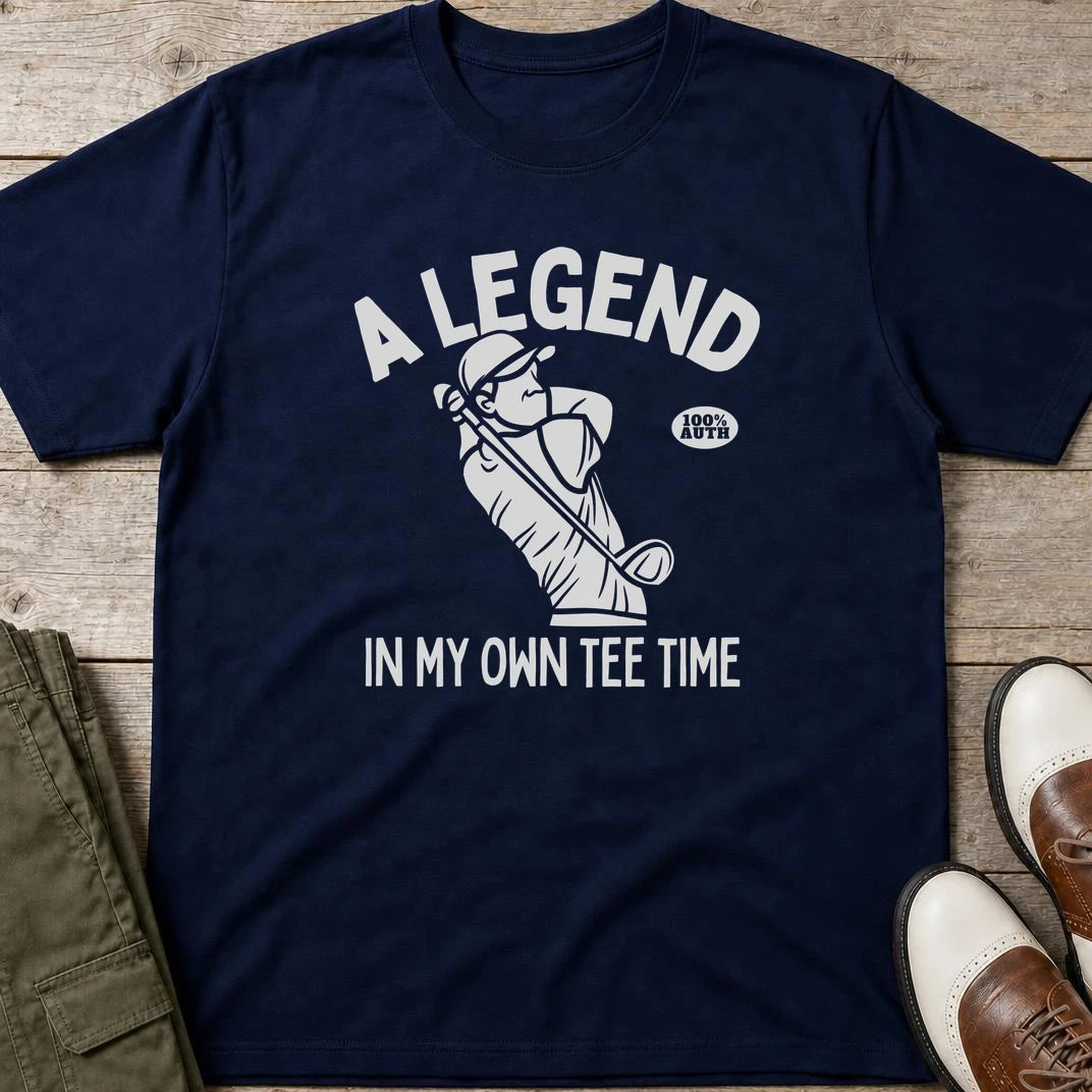 Own Tee Time T-Shirt in Navy lying on a plain floor. T-shirt is a unisex cut and 100 per cent cotton.