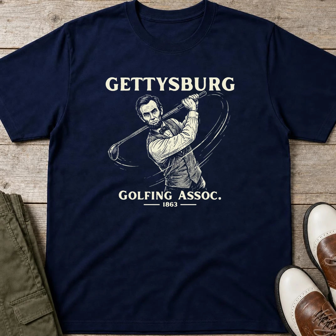 Gettysburg T-Shirt in Navy lying on a plain floor. T-shirt is a unisex cut and 100 per cent cotton.