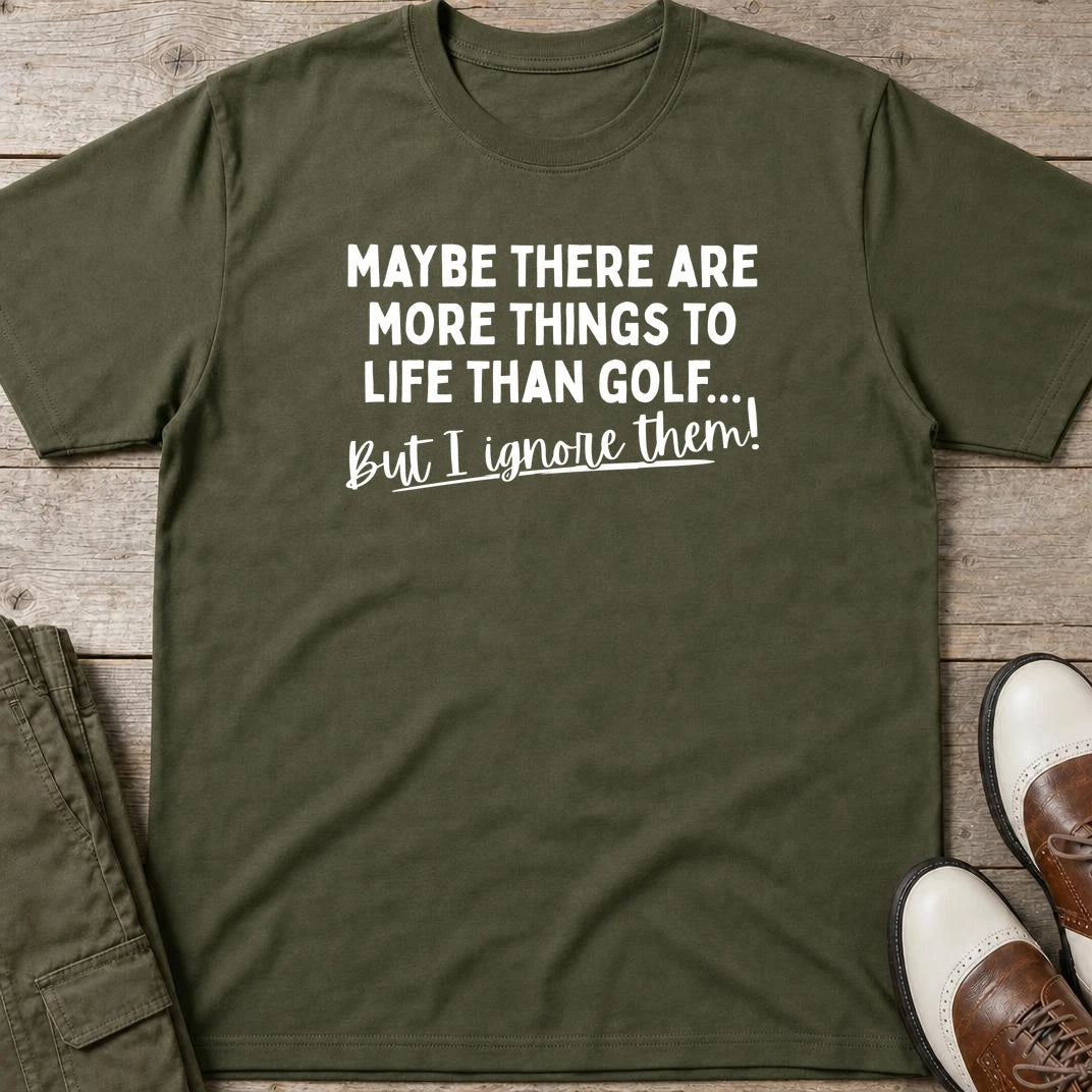 More Things T-Shirt in Military Green lying on a plain floor. T-shirt is a unisex cut and 100 per cent cotton.
