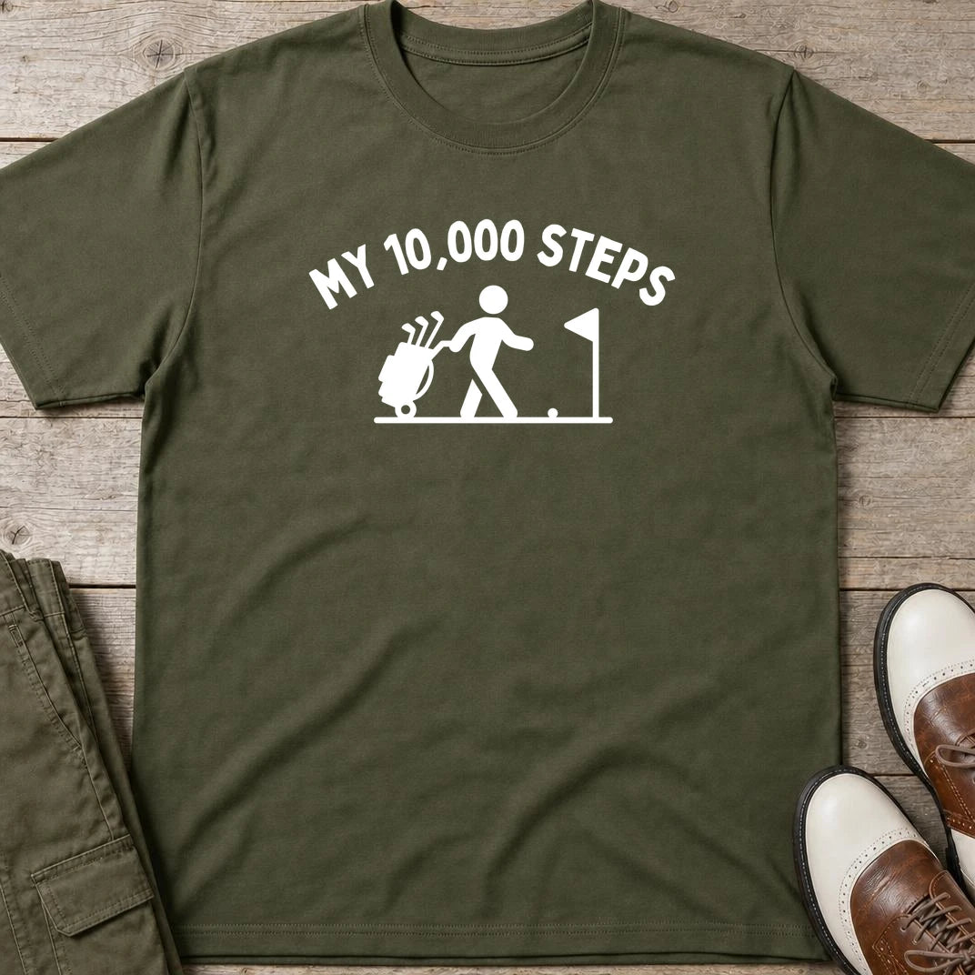 My 10,000 Steps T-Shirt in Military Green lying on a plain floor. T-shirt is a unisex cut and 100 per cent cotton.