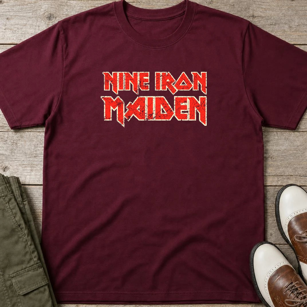 Nine Iron Maiden T-Shirt in Maroon lying on a plain floor. T-shirt is a unisex cut and 100 per cent cotton.