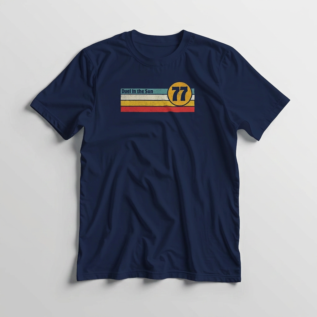 Duel Sun T-Shirt in lying on a plain floor. T-shirt is a unisex cut and 100 per cent cotton.