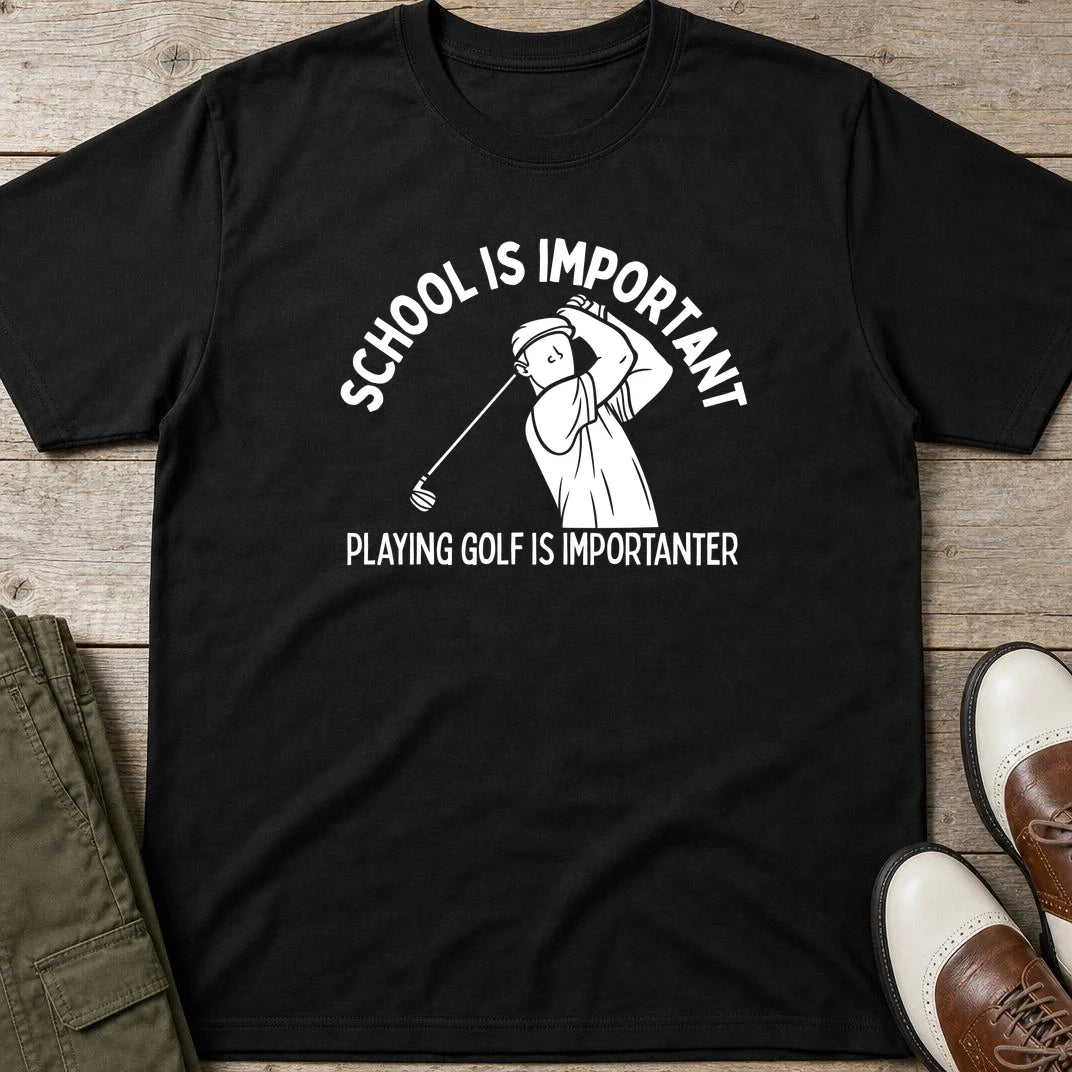 Golf Is Importanter T-Shirt in Black lying on a plain floor. T-shirt is a unisex cut and 100 per cent cotton.