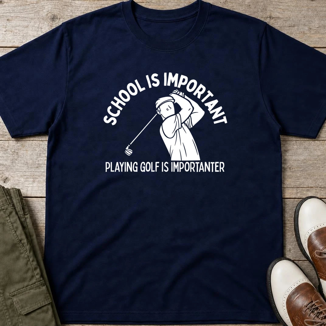 Golf Is Importanter T-Shirt in Navy lying on a plain floor. T-shirt is a unisex cut and 100 per cent cotton.