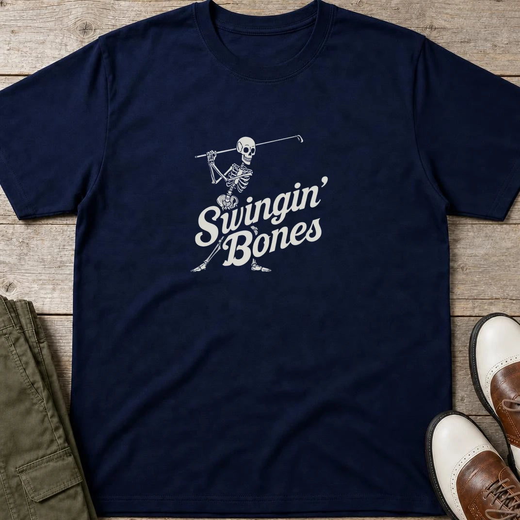 Swingin' Bones T-Shirt in Navy lying on a plain floor. T-shirt is a unisex cut and 100 per cent cotton.