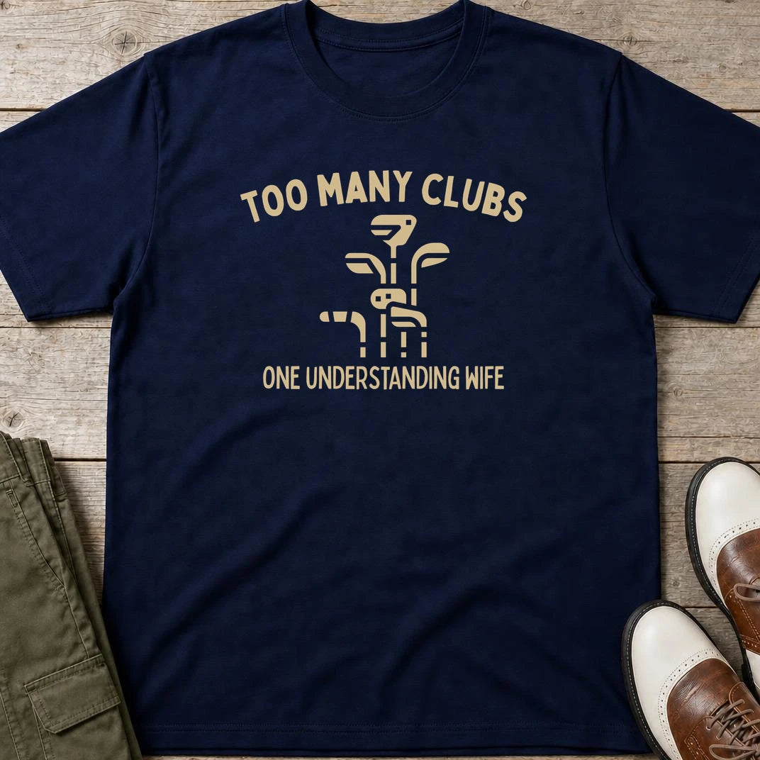 Understanding Wife T-Shirt in Navy lying on a plain floor. T-shirt is a unisex cut and 100 per cent cotton.